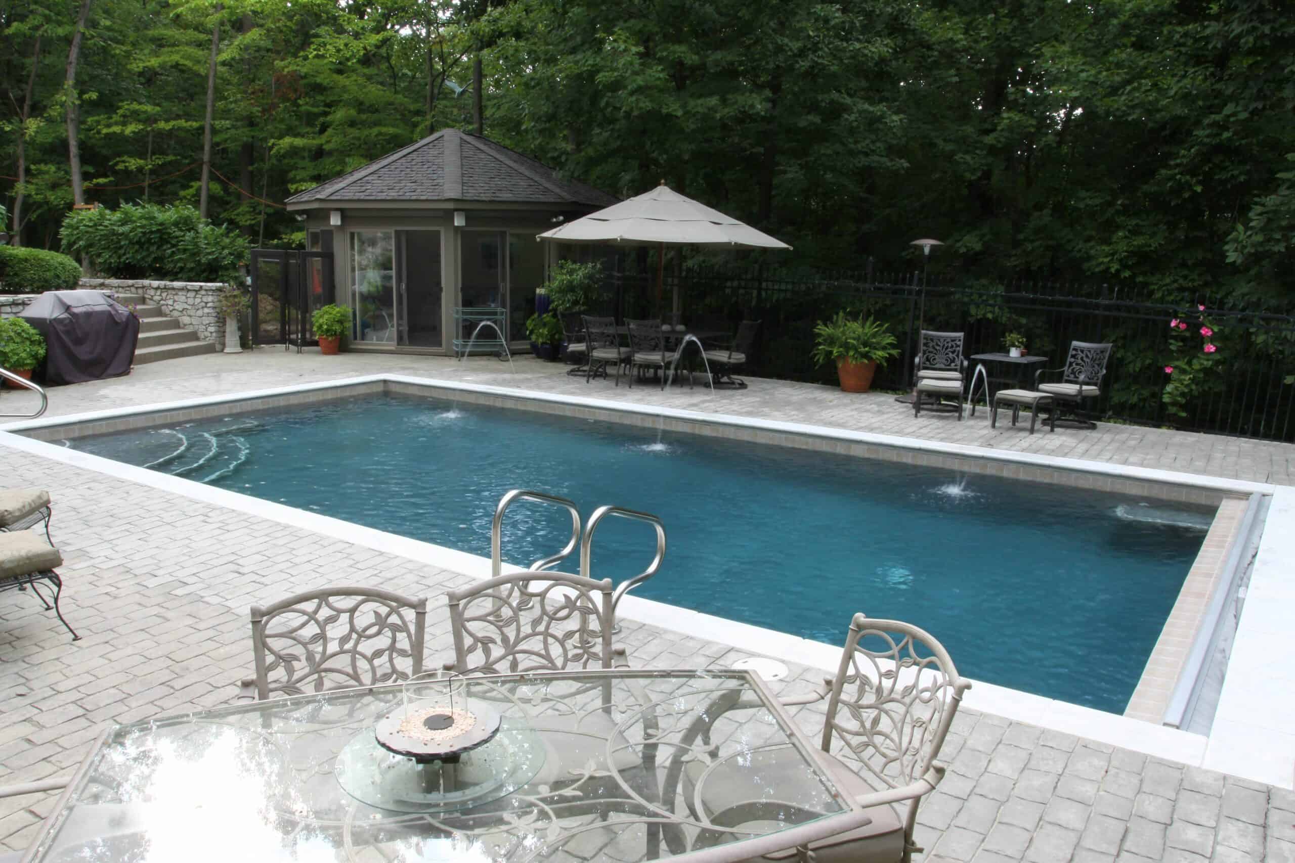 Gunite pool with white marble